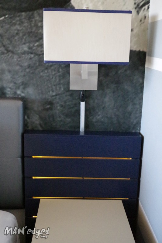 a design detail with illuminating night stands.