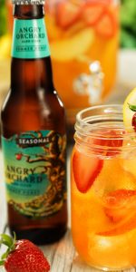 Angry Orchard beer bottle and party punch cocktail for guys