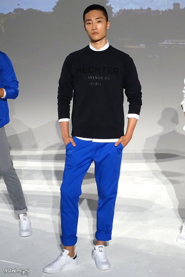 Male models posing at Men's Day Dune Studios in Daniel Hechter wearing black sweater and blue pants MAN'edged Magazine