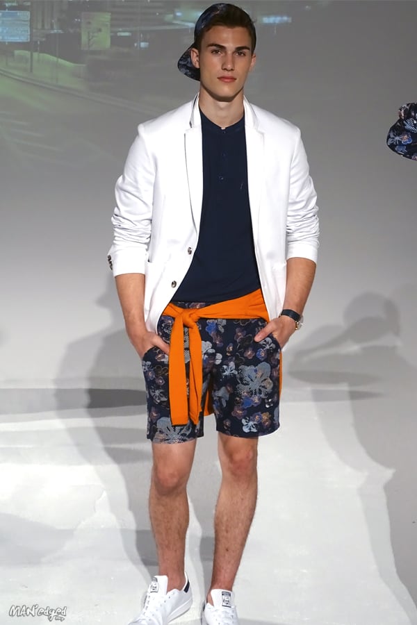 Male models posing at Men's Day Dune Studios in Daniel Hechter wearing white sports coat and shorts MAN'edged Magazine