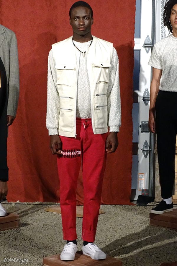 Male models posing at Men's Day Dune Studios in Head of State wearing white vest, shirt, and red pants MAN'edged Magazine