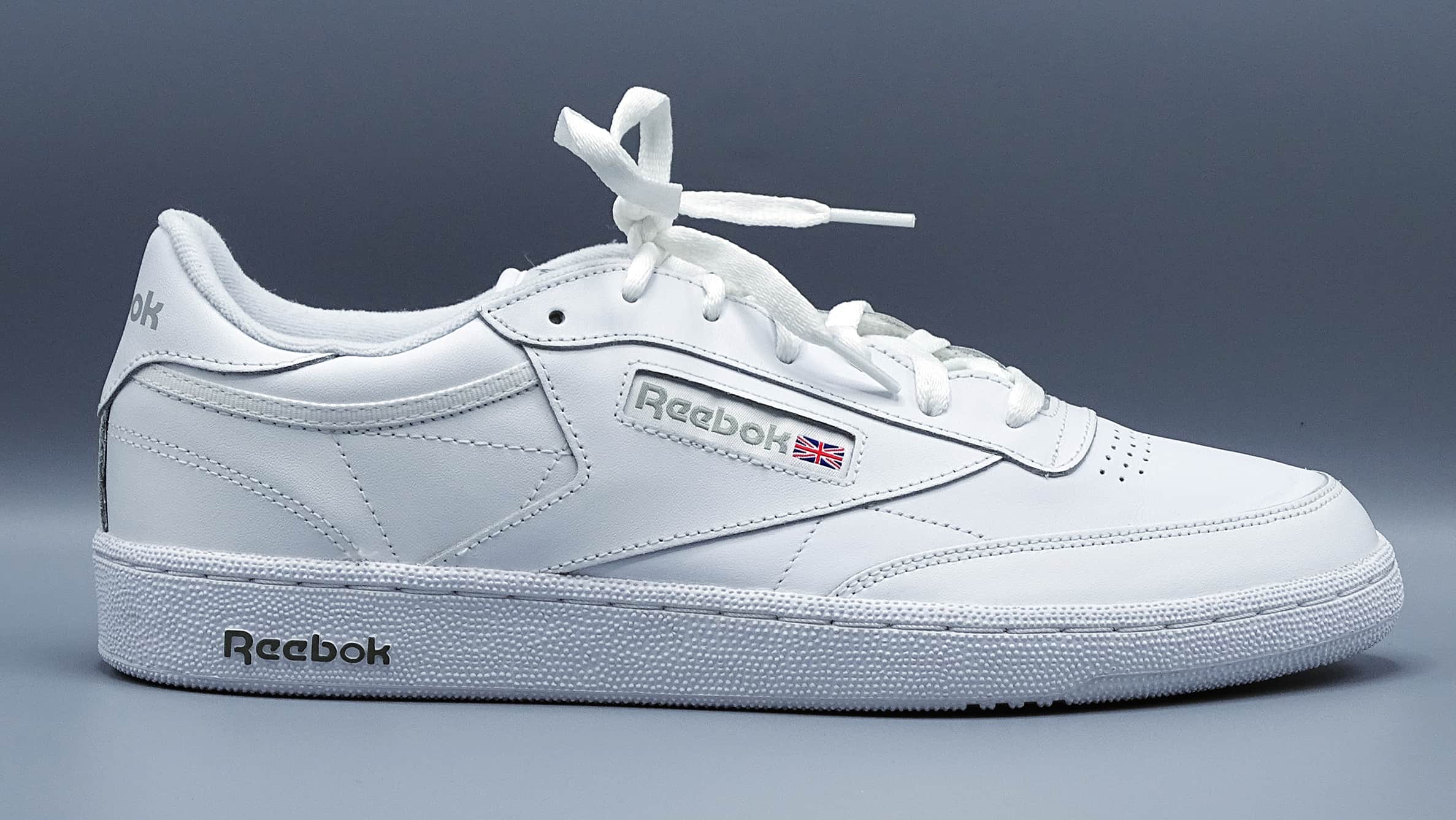 Men's sleek profile all white reebok sneaker