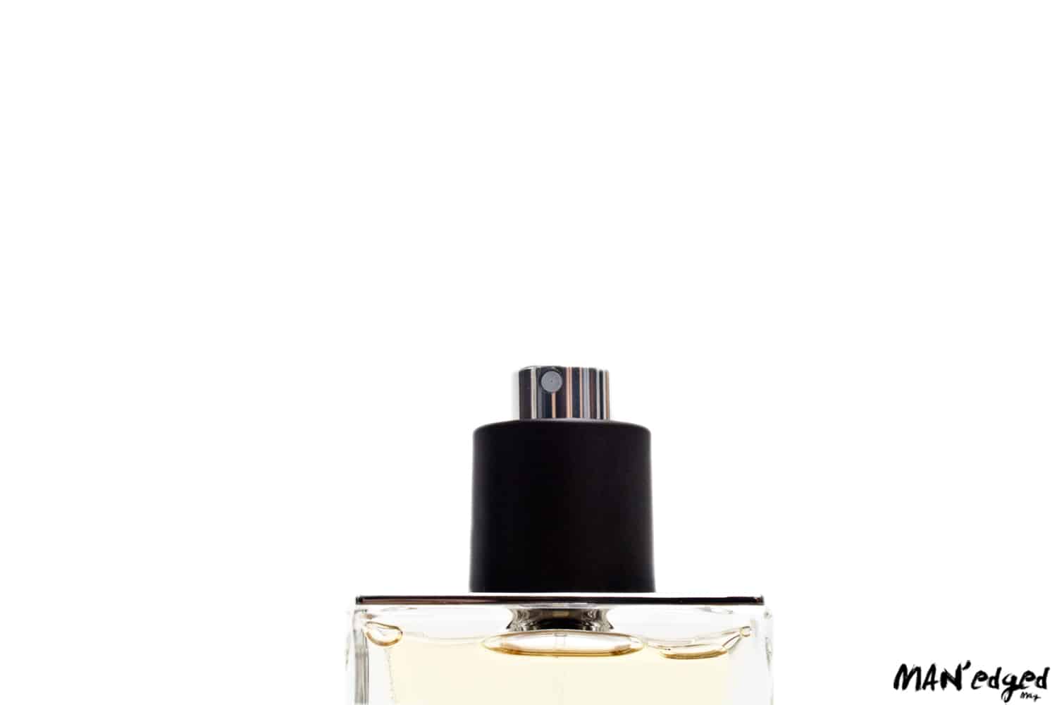 Close up of men's cologne fragrance bottle.