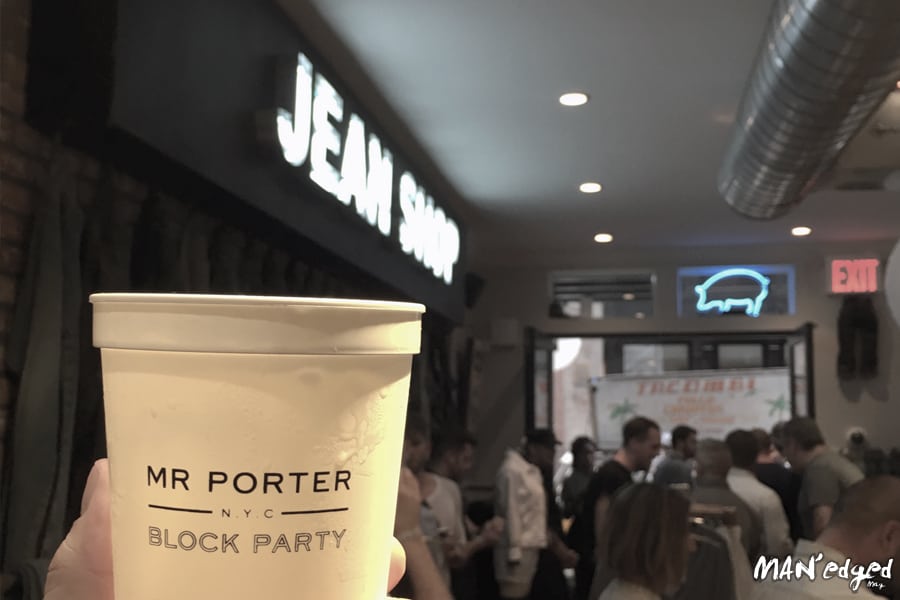 A guests toasting to Jean Shop Crowd at Mr Porter Block event