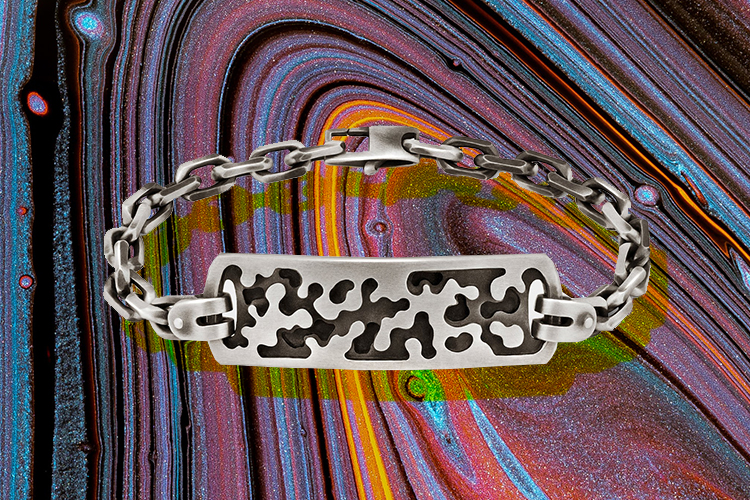 men's silver bracelet by snake bones