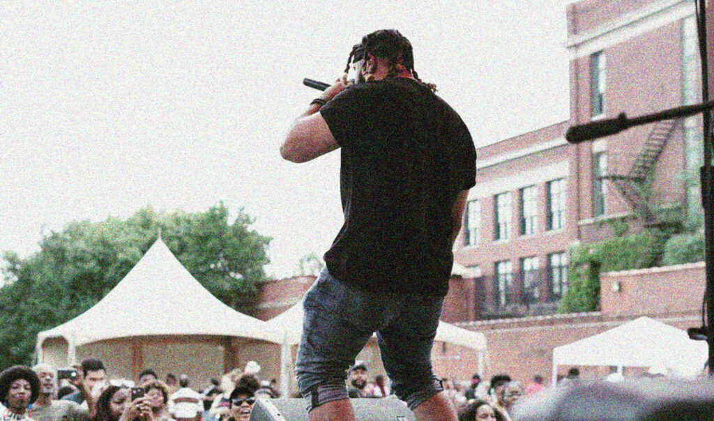 Miami-born rapper, Shepherd, performs live for a crowd.