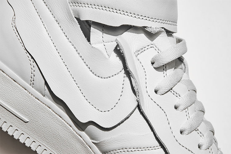 the all white COMME des GARÇONS x Nike Air Force 1 Mid