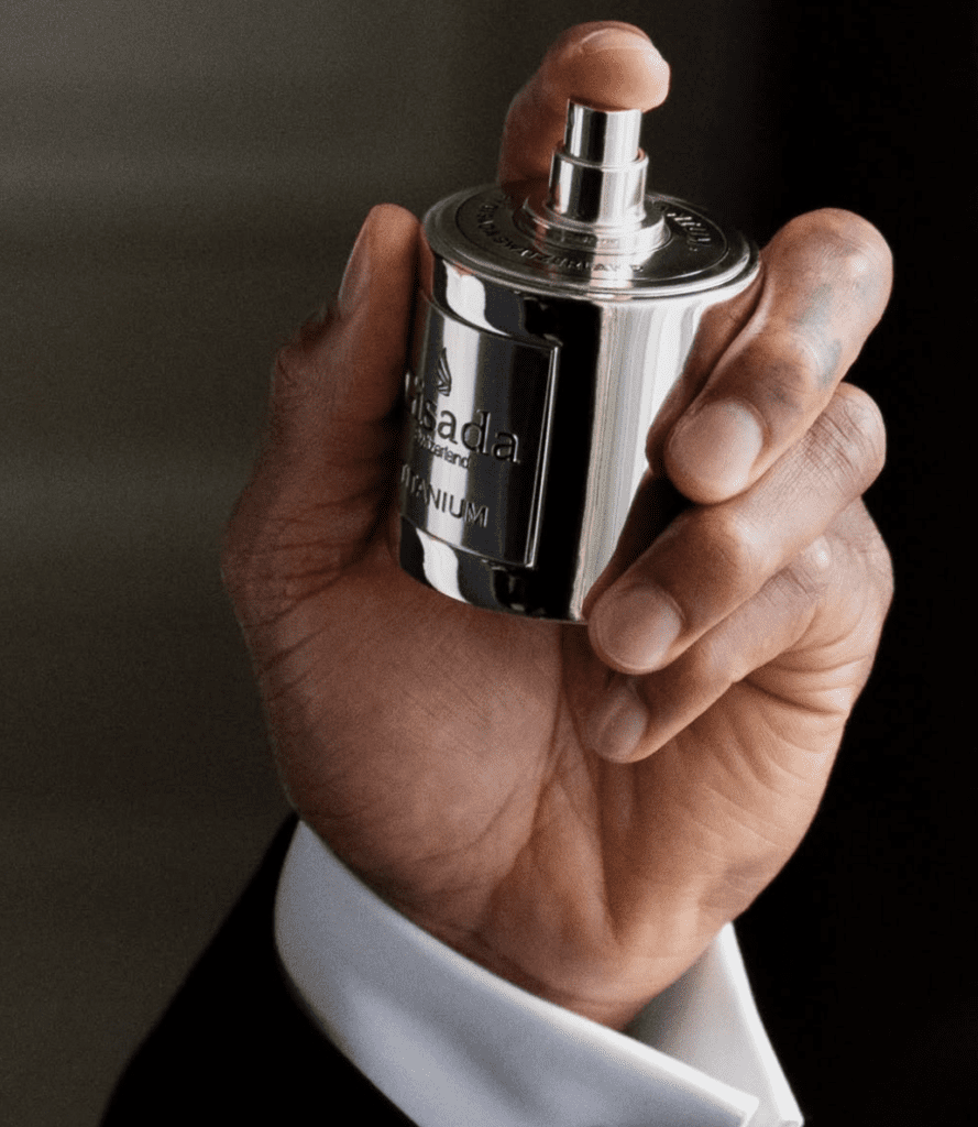 man holding titanium bottle